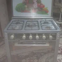 اجاق‌گاز طرح فر صدرا الکتریک و یک عدد دراور