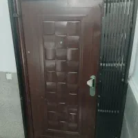 یک عدد درب ورودی واحد چپ باز شود با آکاردونی|مصالح و تجهیزات ساختمان|تهران, شهرک شهید باقری|دیوار