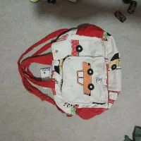 یک ساک لباس همراه ساک نوزادی و کودک