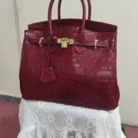 کیف. کیف زنانه چرم زرشکی پوست ماری