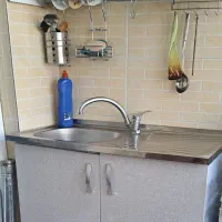 ظرفشوی باسینک و لولش ومیز غذا خوری