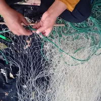 تعمییر تور ماهیگیری