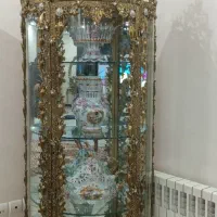 ویترین ساعت اینه شمعدان و سطل  لوستر برنج