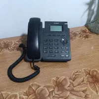 دوتا تلفن رومیزی یکی بیسیم