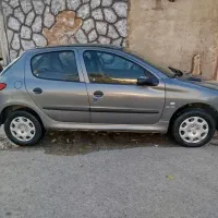 پژو 206بسیار سالم و شیک همه چی نو شده شاسی پلم