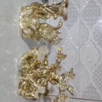 مجسمه دکوری و گل و گلدون مصنوعی