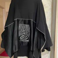 تعدادی شومیز مانتو کیف پالتو دامن پیراهن بارونی