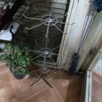 تعدادی مانکن، ویترین کم جا،میز پیشخوان|فروشگاه و مغازه|میانه, |دیوار