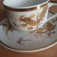 ۶فنجان و۶نعلبکی ویک قندان عتیقه طلاکوب