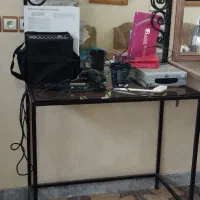 آینه فرفوژه و صندلی