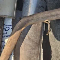 تعدادی وسایل ماشین و دوچرخه و اگزوز به فروش میرسد