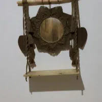 اینه و‌شلف مکرومه