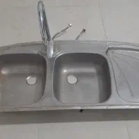 ظرفشویی با شیر آب