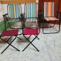 مقداری صندلی تاشو و ضربدری