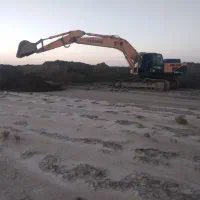 بیل مکانیکی چرخ زنجیری