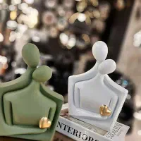 مجسمه آغوش جامدادی گلدان همدم