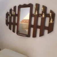 یک عدد رخت اویز ایینه دار ا