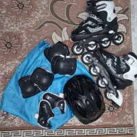 کفش اسکیت همراه با لوازم