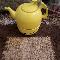 قوری زردرنگ نونو وگلدون شیشه ایی نونو