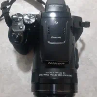 دوربین عکاسیp900نیکون همراباطری اضاف،هود،محافظ لنز