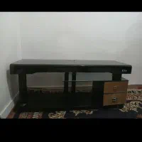 میزتلویزیون شیشه ای