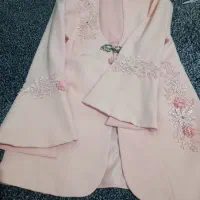 کت و شلوار مجلسی کلادوساعت پوشیده شده