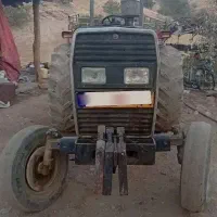 تراکتور و یک دستگاه بیل...