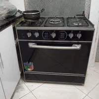 اجاق گاز 5 شعله، تلویزیون بهمراه میز تلویزیون