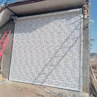 کرکره برقی وشیشه سکوریت درب طلایی سنندج