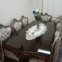 میز غذاخوری ۹ نفره نو و کارنکرده باچوپ گردویی