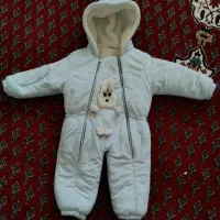 سرهمی نوزاد و گهواره و پشه بند