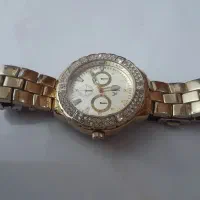 ساعت طلایی زنانه و دستبند نگین دار