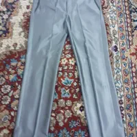 کت وشلوار خاکستری با دکمه های طرح دار
