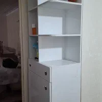 کمد کتابخونه ایستاده  نونو