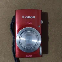 دوربین کانن Canon Ixus 145 به همراه سه پایه مخصوص