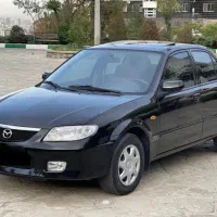 مزدا ۳۲۳مدل۱۳۸۴تیپ ۳ دنده دستی فابریک و سالم