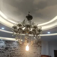 لوستر برنز ۱۲ شعله|لوستر و چراغ آویز|ری, سیزده آبان|دیوار