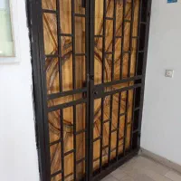 درب چوبی و آکاردئونی