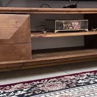 میز تلوزیون و آینه و شمعدان