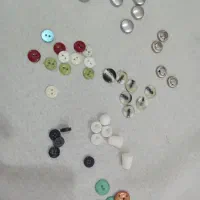 دکمه و سر زیپ