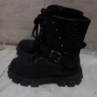 تعدادی کفش لباس بچه