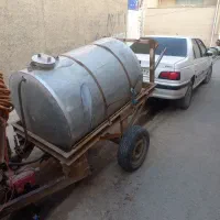 تراکتور مدل هفتاد و تانکر سمپاش و گاواهن