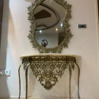 اینه و شمعدان برنجی