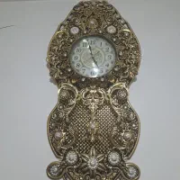 ساعت طلایی رنگ ثابت