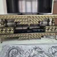 میز تلویزیون ساعت برنزی تابلو سبزی خورد کن