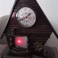 ساعت قدیمی رقص نور