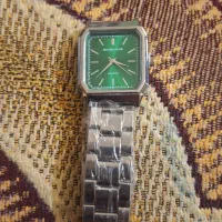 ساعت مچی با دستبند فلزی