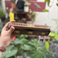 جاعودی چوبی با طرح فیل، زیر سیگاری