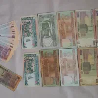 تعدادی اسکناس و سکه قدیمی و جدید خارجی