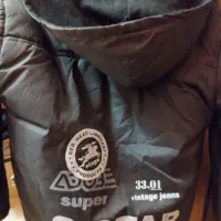 کاپشن برای سنین دبستان. نو.|لباس|شاهینشهر, خبرنگار|دیوار